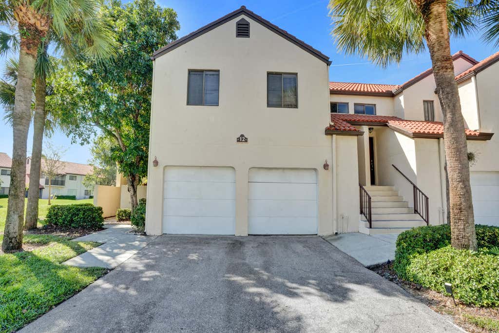 Photo of 12 VIA DE CASAS SUR #101, Boynton Beach, FL 33426 (MLS # B26066035)