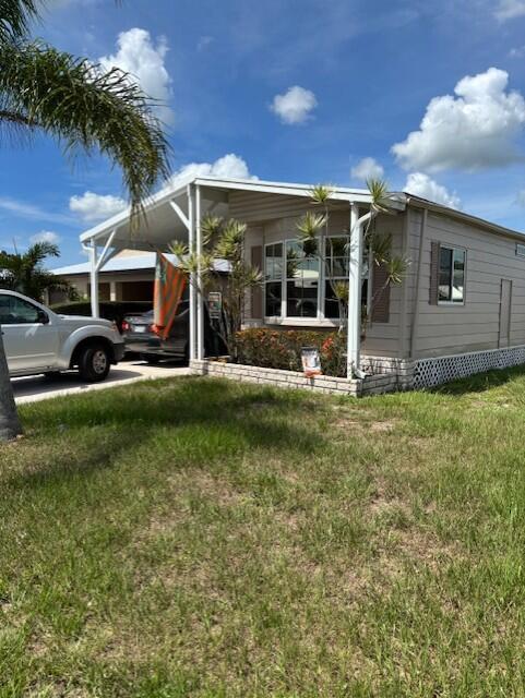 Spacious Furnished 2 Bed, 2 Bath - Low Lot Rent! This 1,380 sq. ft. home offers comfort and upgrades throughout -- newer shingle roof, AC, water heater, and vinyl floors. Enjoy an upgraded kitchen, huge master bedroom, bright windowed Florida room, and rear screened room for relaxing. All in a friendly community with low lot rent of $865. Move-in ready!