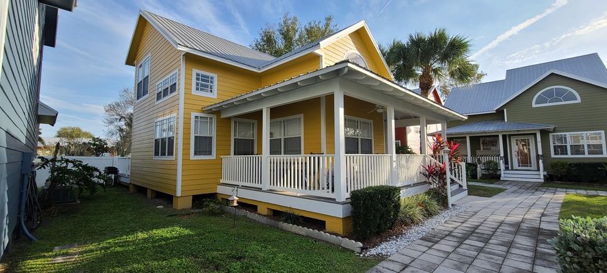Welcome to this charming cottage-style home located in a desirable community along the Rim Canal, offering deep water access from Lake Okeechobee all the way to the ocean. This inviting residence features an open-concept layout filled with natural light, creating a warm and welcoming atmosphere. The home is thoughtfully designed with a durable metal roof, Hardie plank siding, Corian countertops, laminate wood flooring, and cozy carpeted areas. A unique under-stair office/desk space provides the perfect setup for working from home or staying organized. The kitchen is equipped with upgraded appliances, and the home also includes an interior laundry area with washer and dryer for added convenience...... ...A formal dining room, ceiling fans throughout, and a recently replaced A/C system (2024) enhance comfort and functionality. Additional highlights include private covered parking and close proximity to marinas, excellent fishing spots, and endless open-water adventures. Whether you're seeking a full-time residence or a seasonal retreat, this property offers the ideal blend of comfort, convenience, and waterfront living. Schedule your private showing today!