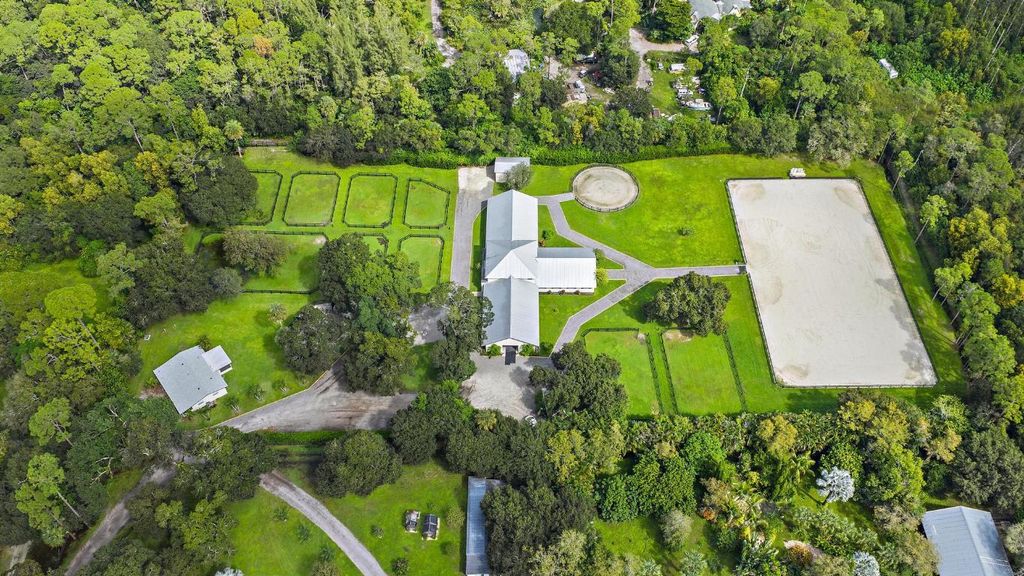 Photo of 14339 Collecting Canal Road, Loxahatchee Groves, FL 33470 (MLS # R11158368)