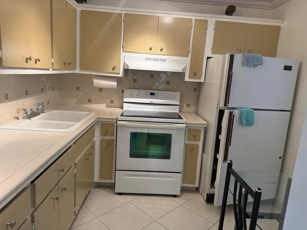 Photo of 2800 NW 47TH Terrace #304B, Lauderdale Lakes, FL 33313 (MLS # B26091005)