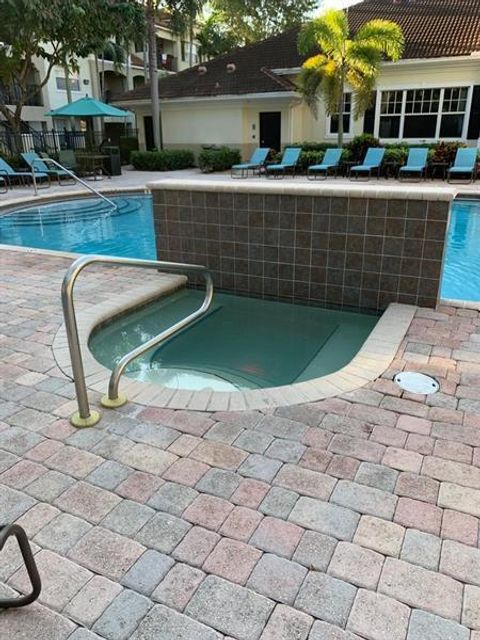 Tiny photo for 6020 W Sample Road #105, Coral Springs, FL 33063 (MLS # B26040580)