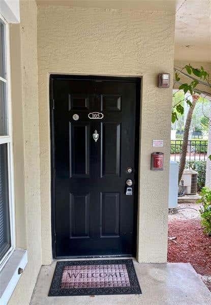 Photo of 6020 W Sample Road #105, Coral Springs, FL 33063 (MLS # B26040580)
