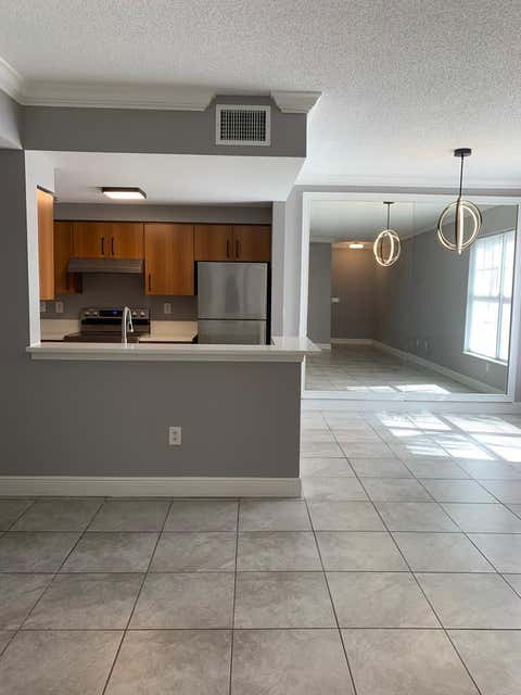 Tiny photo for 6020 W Sample Road #105, Coral Springs, FL 33063 (MLS # B26040580)