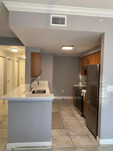 Tiny photo for 6020 W Sample Road #105, Coral Springs, FL 33063 (MLS # B26040580)