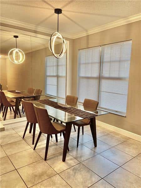 Tiny photo for 6020 W Sample Road #105, Coral Springs, FL 33063 (MLS # B26040580)