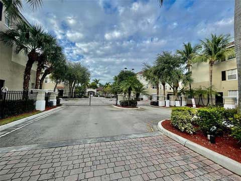 Tiny photo for 6020 W Sample Road #105, Coral Springs, FL 33063 (MLS # B26040580)