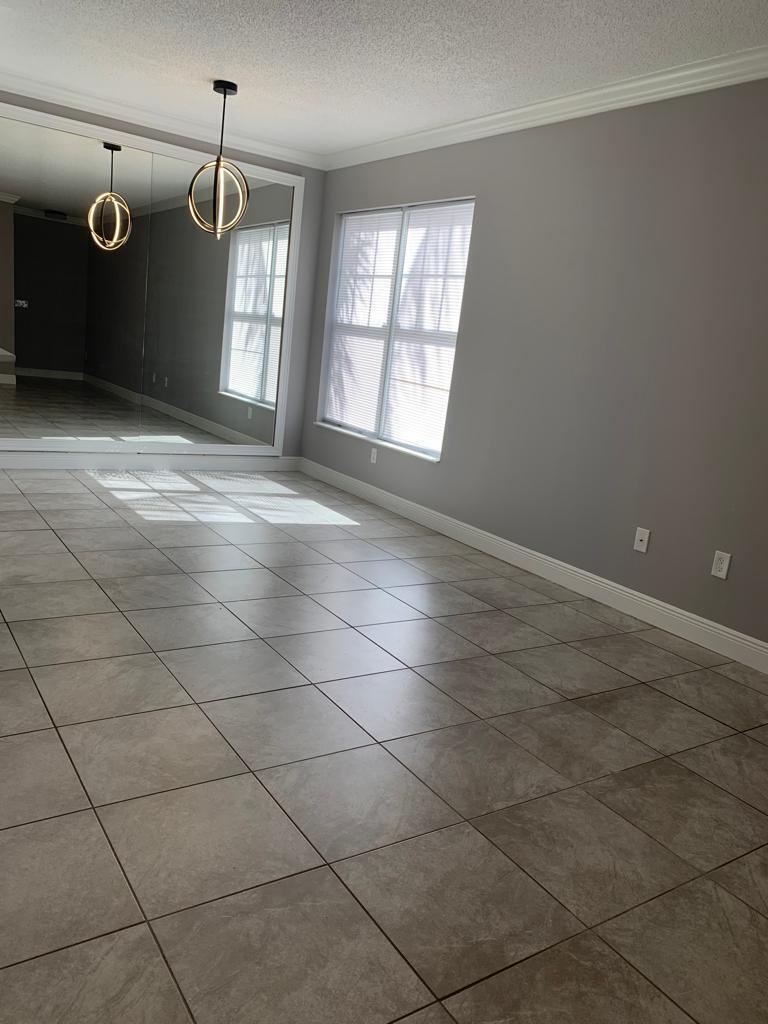 Photo of 6020 W Sample Road #105, Coral Springs, FL 33063 (MLS # B26040580)