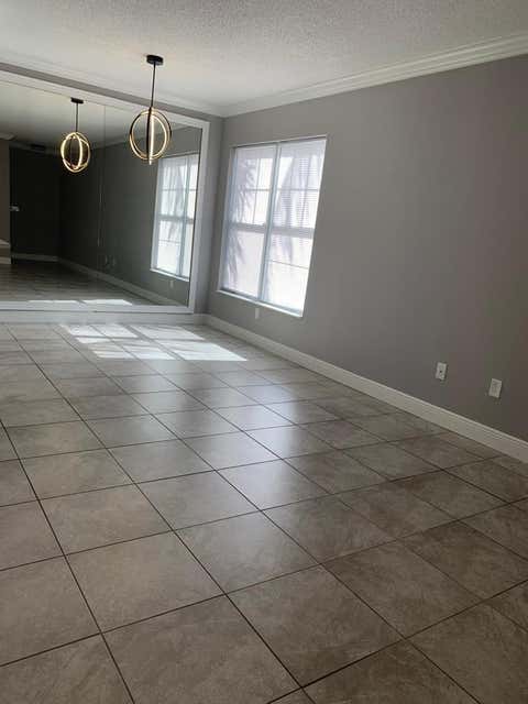 Photo of 6020 W Sample Road #105, Coral Springs, FL 33063 (MLS # B26040580)
