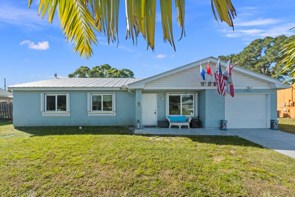 Photo of 374 SE Dalva Avenue, Port Saint Lucie, FL 34984 (MLS # R10964870)