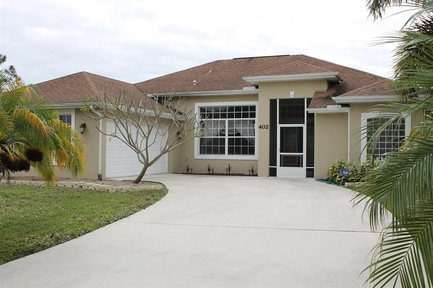 LARGE OPEN FLOOR PLAN POOL HOME. This home is made for family & entertaining. 4 BR, 2 full bath split bdrm design. Upon entering the front door you will notice how open this floor plan is for all to enjoy. Large 2-car gar. is there for cars, toys & storage. A/C was replaced in 2015. Pool was installed in 2018! Water heater was installed April 2018 & has a lifetime warranty. Sliders are equipped w/newly installed remote controlled shades . New Remote operated security system w/cameras. #M security film on windows for extra storm protection & to reduce utility costs. This home is surrounded by complete gutters to channel the rains. Covered & screened back porch where you can sit & watch friends & family enjoy the new above ground pool. This home is located w/easy access to the Turnpike & I95