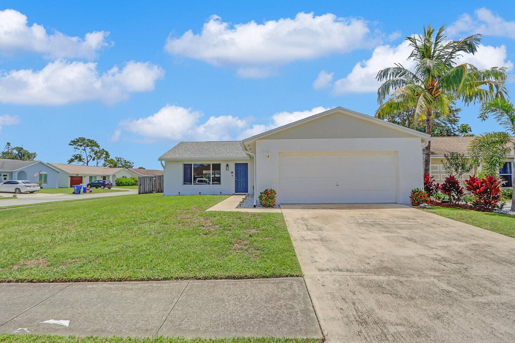 Photo of 157 Banyan Circle, Jupiter, FL 33458 (MLS # R11032310)