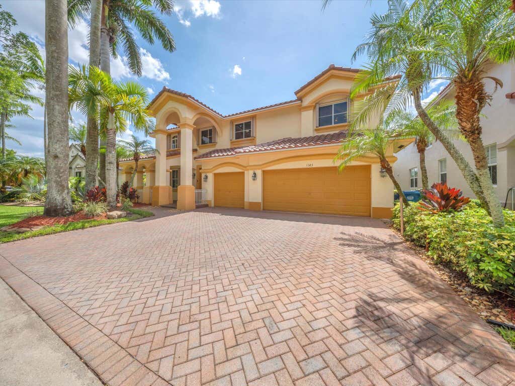 Photo of 1383 Crossbill Court, Weston, FL 33327 (MLS # B26043850)