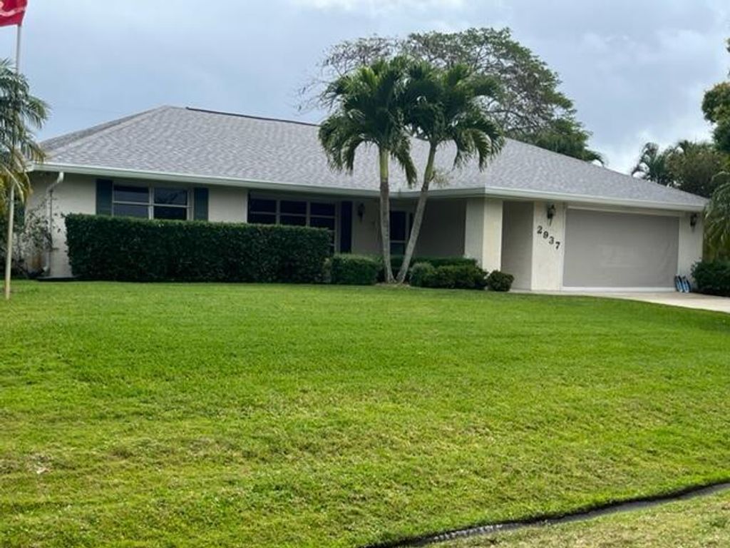 Photo of 2937 SE Farley Road, Port Saint Lucie, FL 34952 (MLS # R10782243)