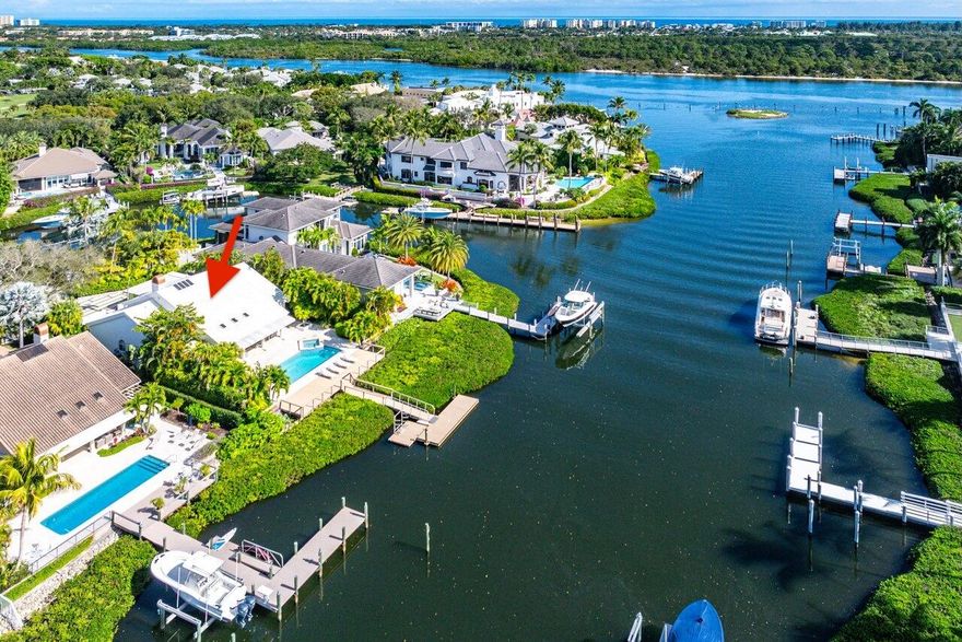 Turnkey navigable waterfront living in Admirals Cove. Enjoy partial Intracoastal views, a private floating dock with ocean access, and seamless indoor-outdoor living.  Fully renovated single-story home featuring soaring ceilings, wide-plank wood floors, designer kitchen and baths, impact glass throughout, whole-house generator, and newly resurfaced pool.  Located on a quiet cul-de-sac within the premier gated club and waterfront community offering golf, tennis, pickleball, boating, marina, dining, spa & fitness and year-round children's activities & amenities.  Also available for rent in MLS ID #:  RX-11148697.  Minimum 6 months, but prefer one (1) year.   Golf Membership purchase