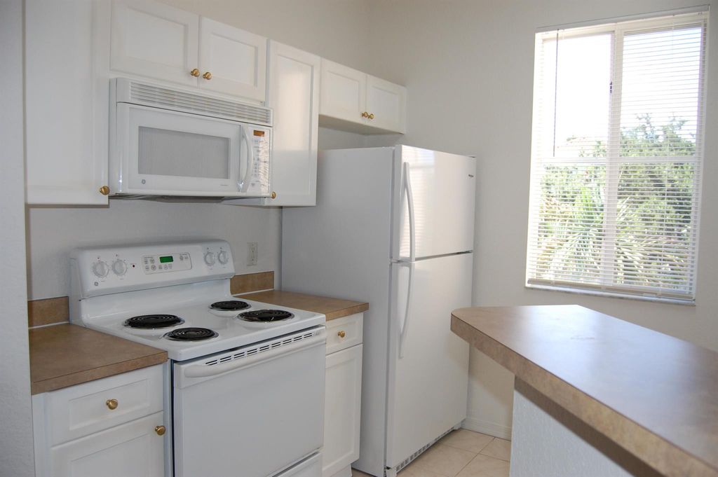 Photo of 11011 Legacy Lane #301, Palm Beach Gardens, FL 33410 (MLS # R10995393)