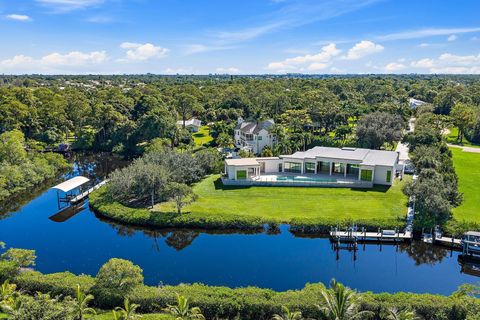 Photo of 8309 SE RIVERS EDGE Street, Jupiter, FL 33458 (MLS # B26054828)