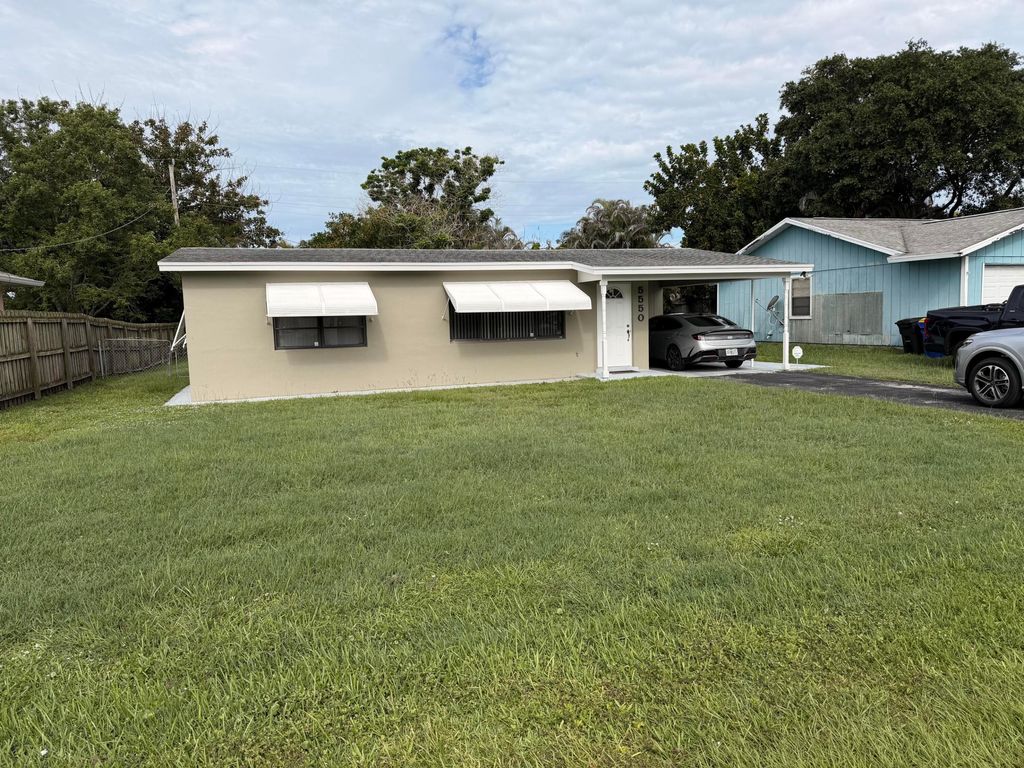 Photo of 5550 SE Normandy Avenue, Stuart, FL 34997 (MLS # B26034920)