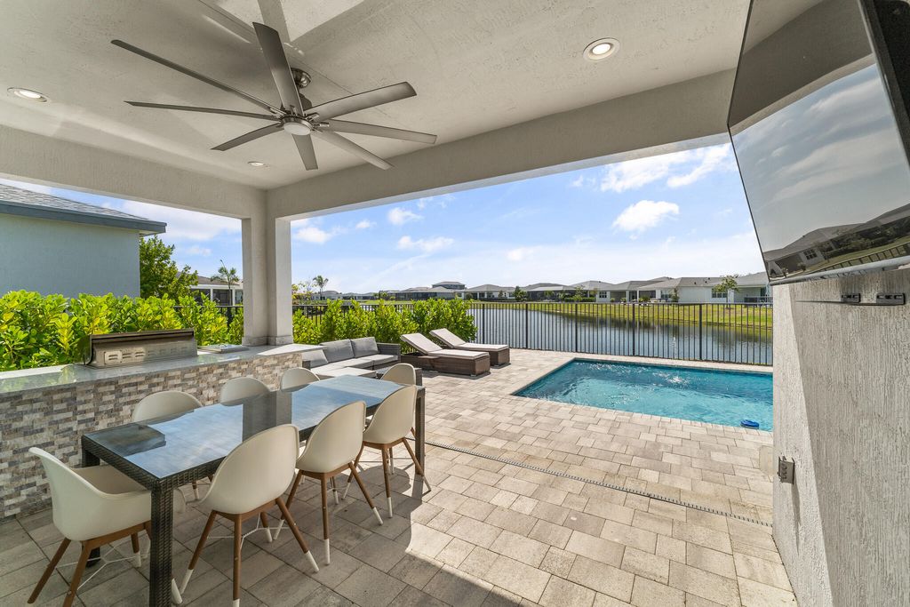 Photo of 11244 SW Lyra Drive, Port Saint Lucie, FL 34987 (MLS # B26027506)