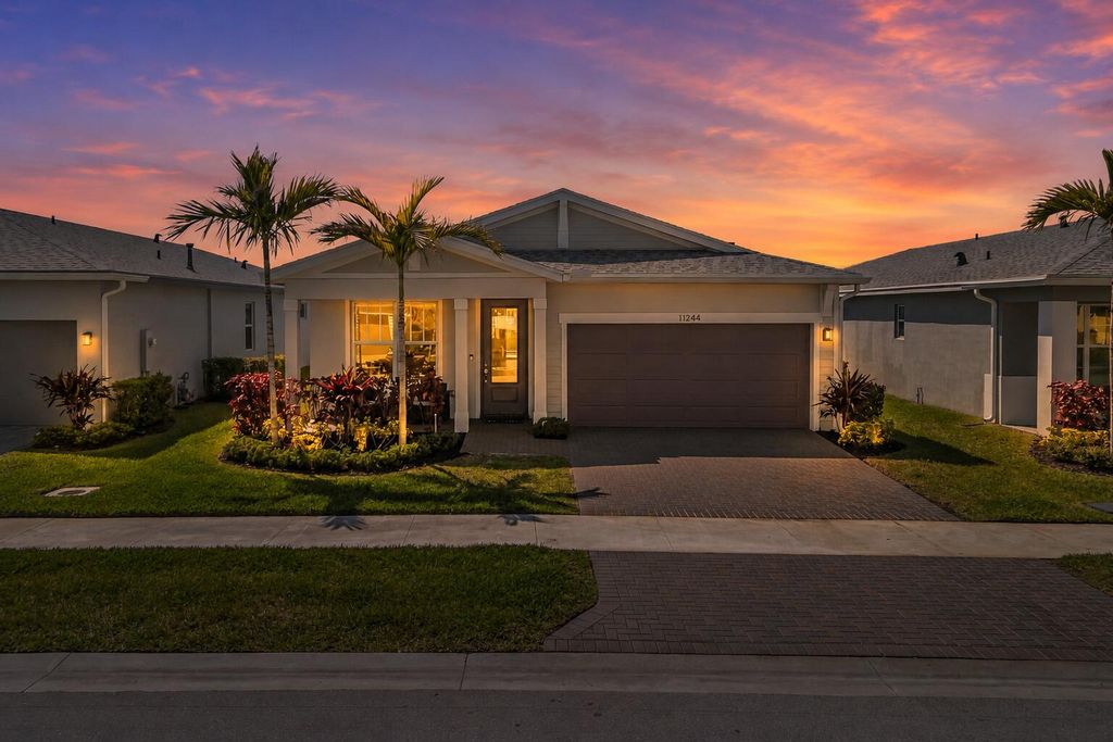Photo of 11244 SW Lyra Drive, Port Saint Lucie, FL 34987 (MLS # B26027506)