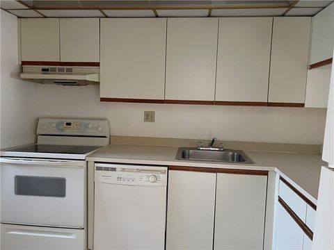 Photo of 7925 S Colony Circle #107, Tamarac, FL 33321 (MLS # B26002735)