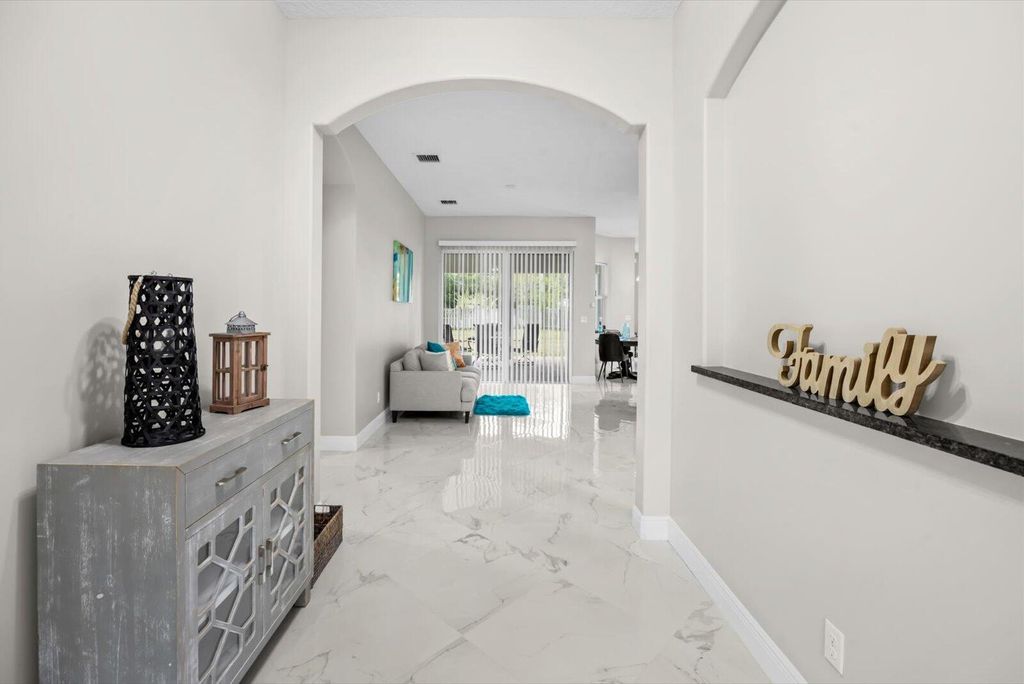 Photo of 562 SW Souris Avenue, Port Saint Lucie, FL 34953 (MLS # R11159804)