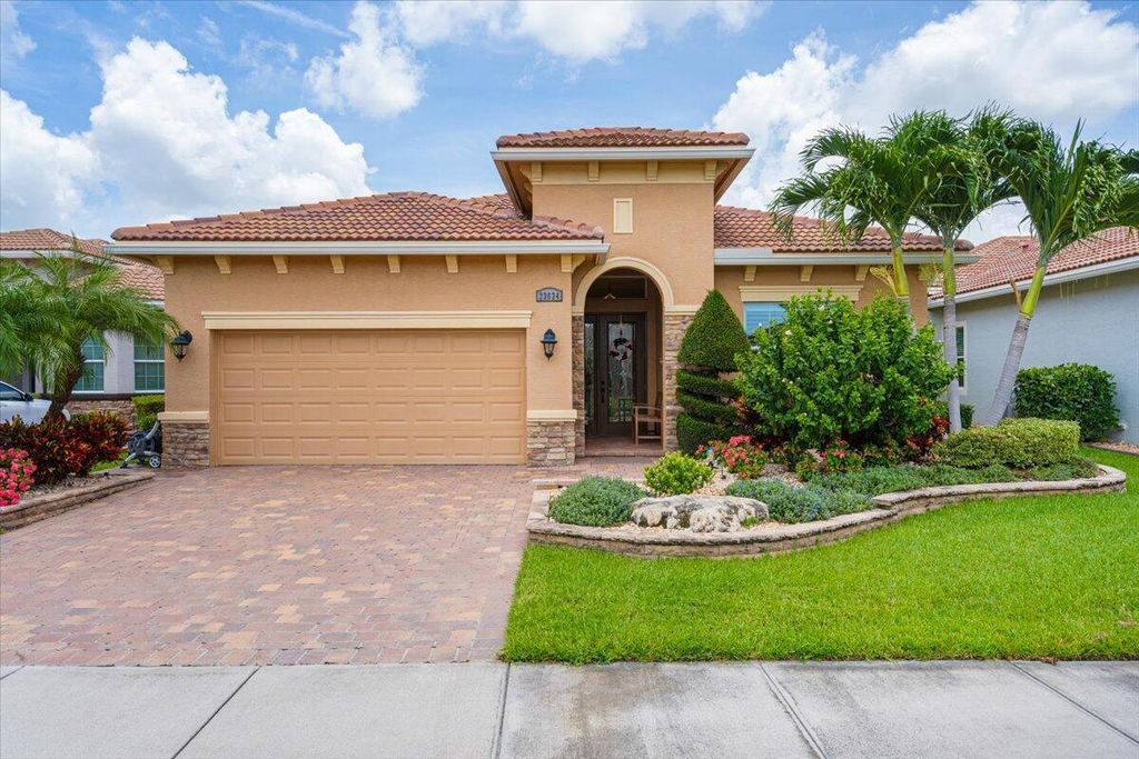 Photo of 23034 SW Accesi Way, Port Saint Lucie, FL 34986 (MLS # R11106495)