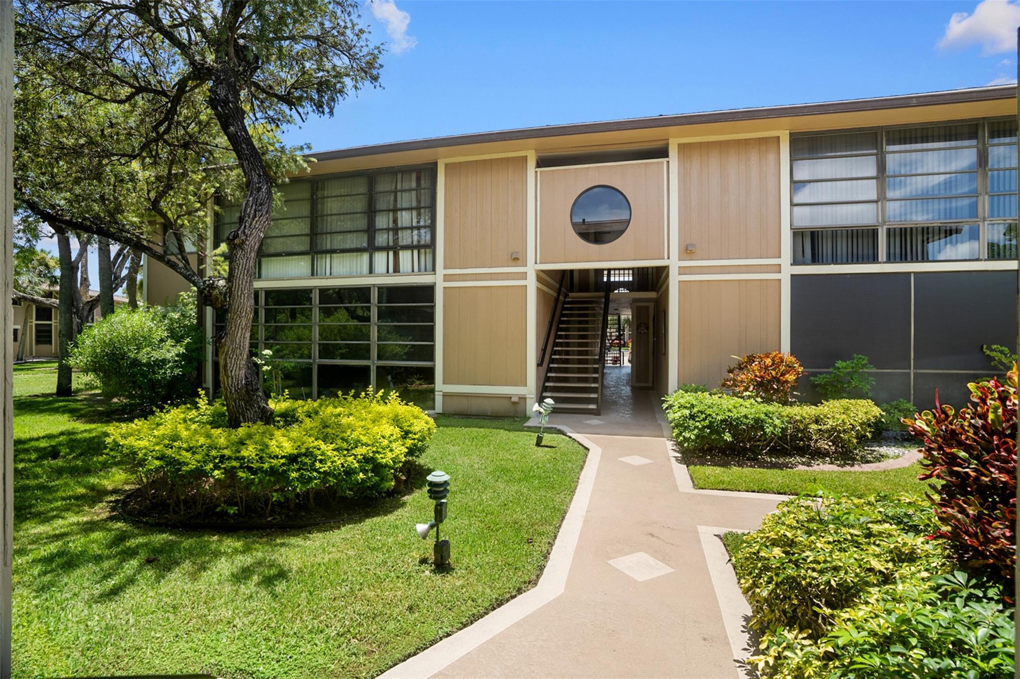 Welcome to your perfect Florida retreat in Kings Point! This spacious, well-maintained 2/2 FIRST FLOOR condo with washer and dryer, offering comfort & convenience. Step inside to an open floor plan with plenty of natural light, kitchen with island, and generous living area perfect for entertaining. The primary suite features an en-suite bath, while the second bedroom is ideal for guests or a home office. Enjoy your morning coffee or evening breeze on the patio, just steps from the pool. You'll have access to the master association, which also features a pool, tennis courts, clubhouse, fitness center, and social events. Located near shopping, major highways, dining, medical facilities, and golf courses, this home offers the perfect blend of peace and accessibility.