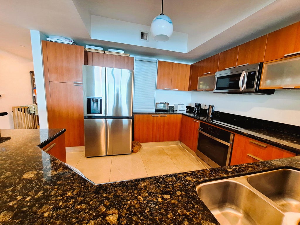 Photo of 2650 Lake Shore Drive #1705, Riviera Beach, FL 33404 (MLS # B26069621)