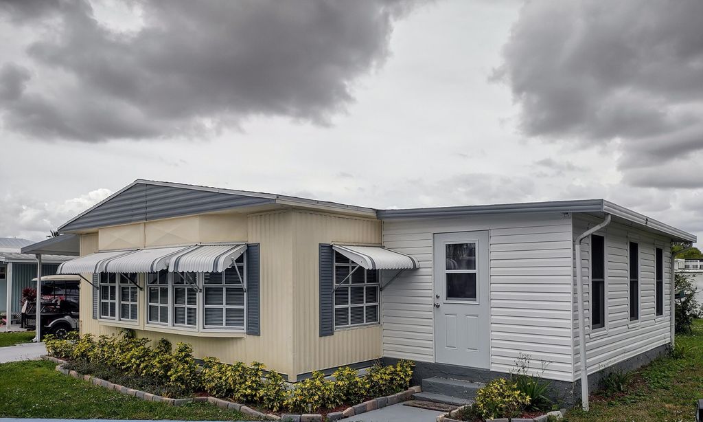Photo of 10 Brisa Lane, Port Saint Lucie, FL 34952 (MLS # R10934183)