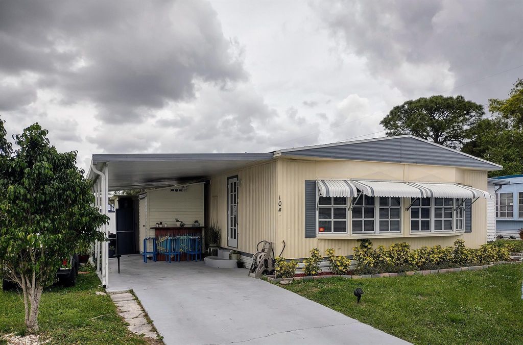 Photo of 10 Brisa Lane, Port Saint Lucie, FL 34952 (MLS # R10934183)