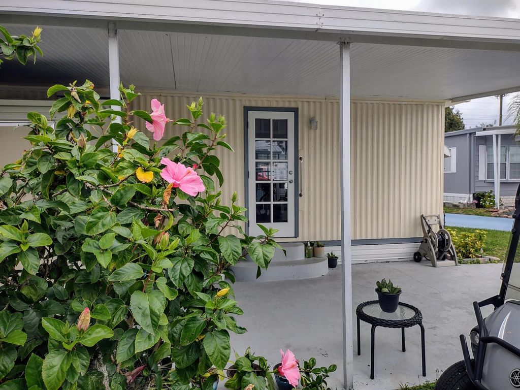 Photo of 10 Brisa Lane, Port Saint Lucie, FL 34952 (MLS # R10934183)