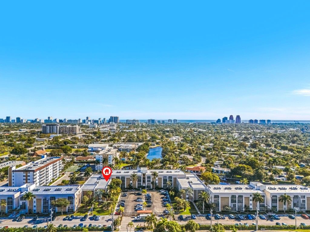 Photo of 3020 NE 16th Avenue #105, Oakland Park, FL 33334 (MLS # F10543607)