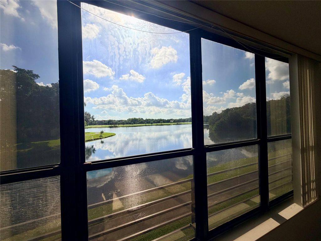 Photo of 2907 Carambola Cir S #201, Coconut Creek, FL 33066 (MLS # F10538481)