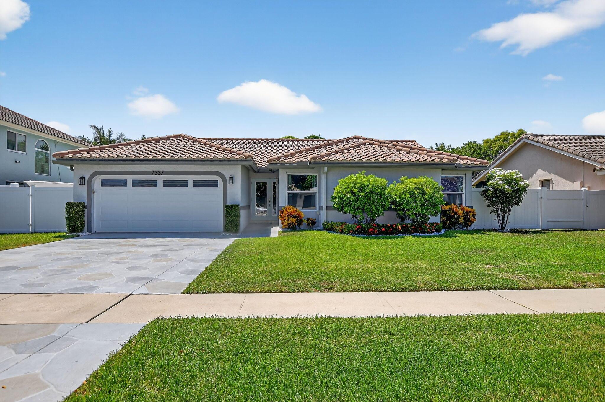 Welcome to Hidden Valley, East Boca Raton! This fully renovated 3-bedroom, 2-bathroom single-family residence blends modern upgrades, a serene canal view, and a prime location in an A-rated school district -- all with no HOA fees.Step inside to a bright, open layout featuring beautifully remodeled bathrooms, stylish new interior doors, impact-rated windows and doors, a newer A/C system 2020, water heater 2021, and a hurricane-rated garage door with a new motor and remote. Enjoy South Florida living in your private backyard oasis with tranquil canal views, new wrought iron fencing, a resurfaced pool patio, and a new pool pump -- perfect for relaxing or entertaining. The roof has also been professionally cleaned and maintained for added peace of mind. Don't miss out on this opportunity!