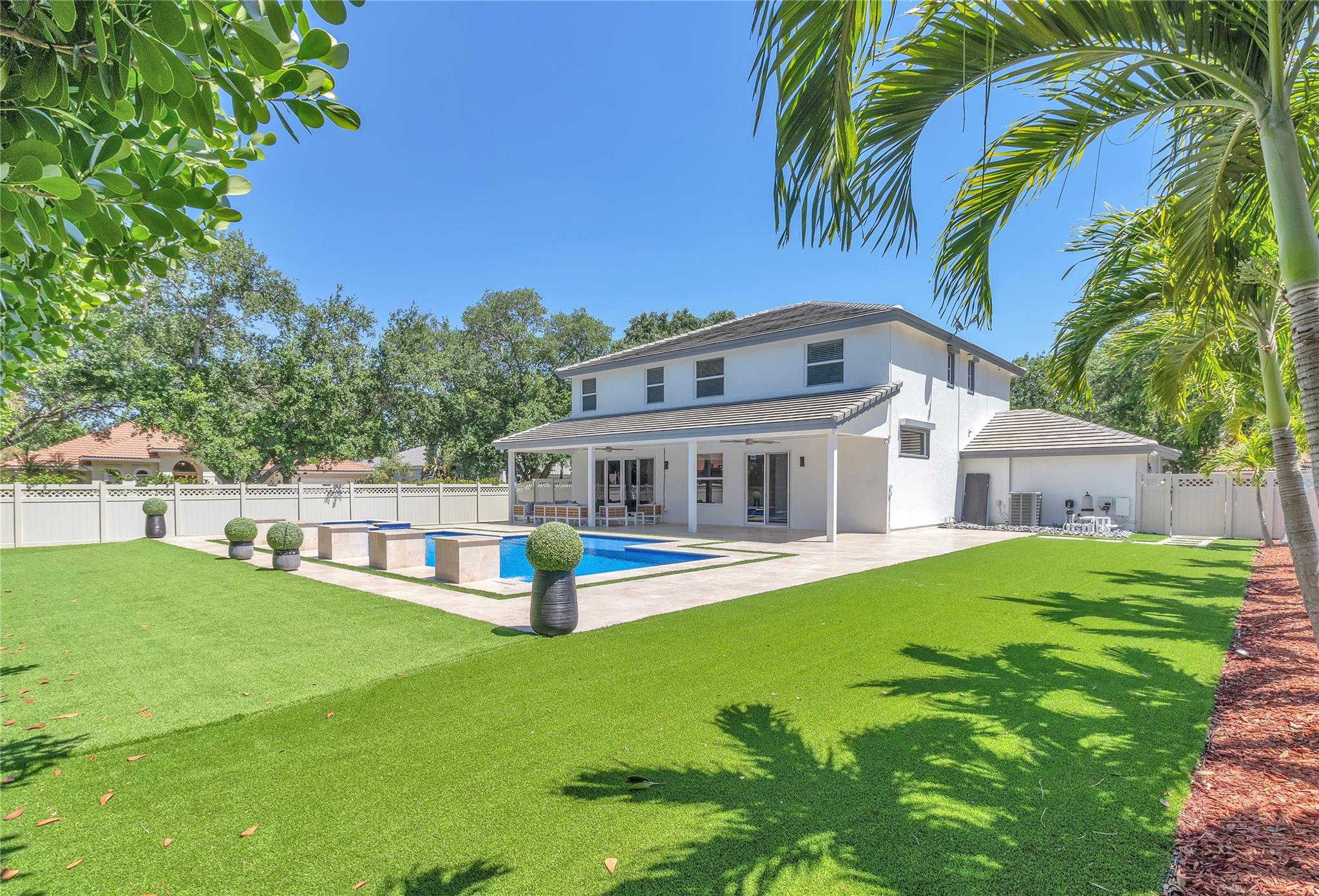 NO HOA! Stunning 4and half Bedroom, 3.5-Bath Estate with 3-Car Garage
Tucked away on a peaceful cul-de-sac, this meticulously crafted estate offers elegance, comfort, and privacy with no HOA restrictions. Featuring 4 to 5 spacious bedrooms and 3.5 luxurious baths, this home showcases superior craftsmanship and thoughtful design throughout.
Enjoy an expansive open-concept layout, highlighted by a state-of-the-art gourmet kitchen built to impress. Custom finishes, LED lighting, and high-end details lend a sense of refined sophistication to every room.
New hurricane-impact windows provide safety and energy efficiency, while the lushly landscaped backyard offers a true private retreat. Relax or entertain in the resort-style pool area with a generous covered patio.