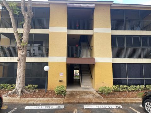 Photo of 3083 N Oakland Forest Drive #308, Oakland Park, FL 33309 (MLS # F10519324)