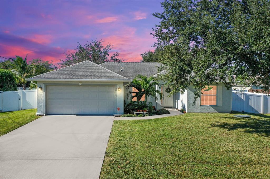 Photo of 3714 SW Kakopo Street, Port Saint Lucie, FL 34953 (MLS # R10761433)