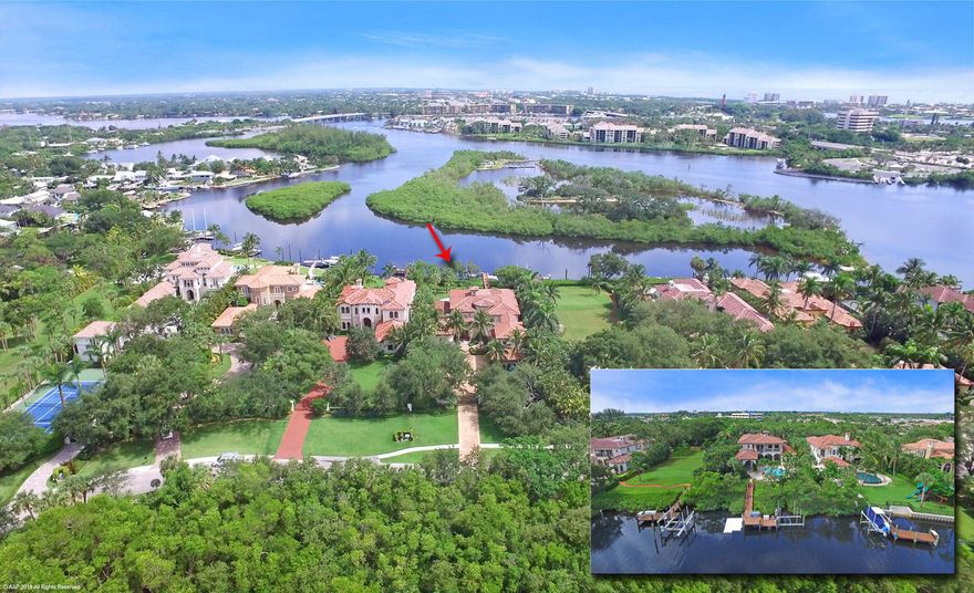 Luxury estate home with 90 feet of waterfrontage. Deep water dock just minutes from the Jupiter Inlet. From the minute you enter through the private gate one can see the attention to detail which is evident everywhere. Beautifully designed, renovated and appointed with top of the line finishes throughout. 5 bedrooms, 6 full bathrooms, a theater room, a loft, a wine cellar, an outdoor kitchen, full house generator, impact windows... This house has it all.