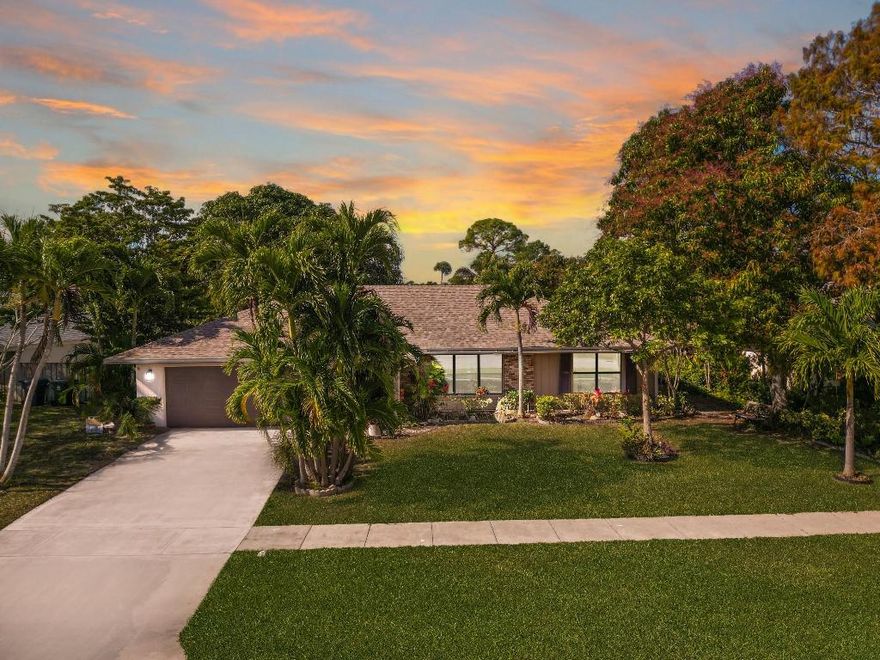 Situated in one of Wellington's most sought after neighborhoods near the polo grounds, this CBS single story ranch offers incredible potential in a true location, location, location setting. Located in a quiet, friendly community with no HOA, and within walking distance to A rated schools and multiple places of worship, making it ideal for a growing family. Recent updates include a NEW ROOF and AC in 2025, impact rated front windows, and hurricane protection throughout the home. Tile flooring runs through the main living areas, and the kitchen features granite countertops. The property offers a split floor plan, great bones, a screened in pool with spacious patio, and mature landscaping including mango trees. A perfect opportunity to add your personal touch and create your dream home!