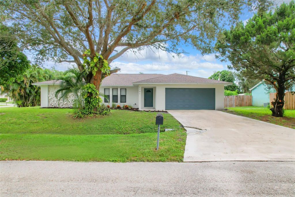 Photo of 1701 SE Ridgewood St, Port St Lucie, FL 34952 (MLS # F10402110)
