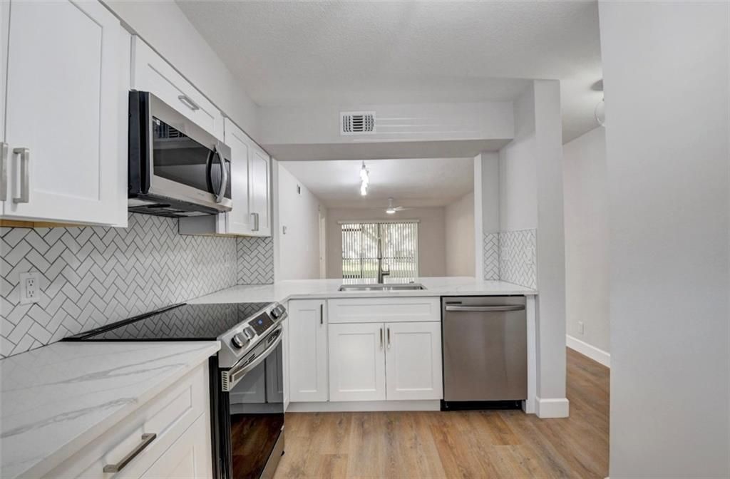 Photo of 3100 Millwood Terrace #1060, Boca Raton, FL 33431 (MLS # F10368448)