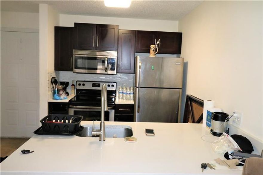 Recently remodeled large studio, all tiles, complex with swimming pool and other amenities.