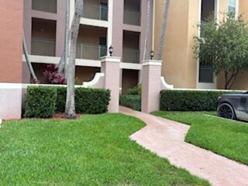 Photo of 11780 Saint Andrews Place #105, Wellington, FL 33414 (MLS # R11169950)