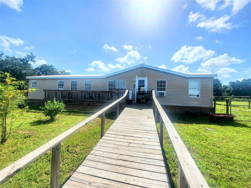 Beautiful home and country living on this 1-acre property! with room to make it your own this property is ideal for those looking for space. Featuring a barn, horse stalls, and chicken coops, its ready for animals and a variety of agriculture uses. With plenty of space, you can create your own mini farm with room to grow. Conveniently located with easy access to town. Don't let this one pass you by!