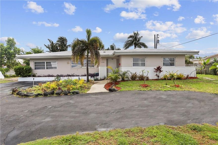 This 3BR / 3 BA home is gorgeous, spacious, & incredibly flexible to be whatever you want. Live in it as expansive 3BR + bonus or use either of the BR suites with exterior entrances for mother in law suite or separate units. Light, bright living spaces & lovely updated kitchen. Circular driveway & generous boat/RV parking is boater's dream located just around the corner from public boat ramp access. Great Pompano neighborhood less than a mile to the beach and new water taxi stop on the ICW.
