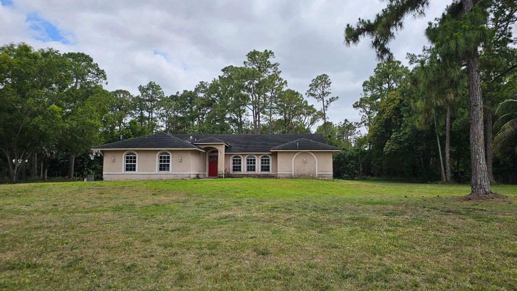 Photo of 12436 N 54th Street, The Acreage, FL 33411 (MLS # R11088600)