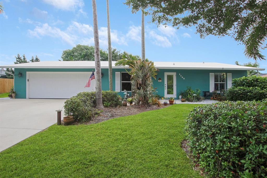 Photo of 1162 SE Palm Beach Road, Port Saint Lucie, FL 34952 (MLS # R10754998)
