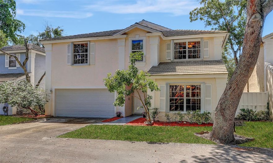 REDUCED TO SELL NOW! LARGE Incredible 5 bedroom 3 Bathroom 2-car garage home at LOW Price. Private fenced yard, two covered patios;ground floor is screened. Soaring Ceilings! Spacious Living room, family room, dining room and kitchen! Kitchen has island, many cabinets, stainless steel appliances, Wall Oven, microwave, Stove top, 2019 Refrigerator, 2024 Dishwasher, Disposal; and two pantries. Spacious Family Room with sliding doors to backyard. Laundry Room w/2019 Front Loaders. New A/C 2020, new W/H 2019. DOWNSTAIRS Bedroom & Updated FULL Bathroom. Huge Upstairs; spacious landing/loft overlooking the 2-story living room. Enter the double doors to Primary Suite, with WICs, Balcony & SUMPTUOUS BATHROOM. Other side has 3 bedrooms & a bathroom! All Hurricane Protected. Community Pool & Park.