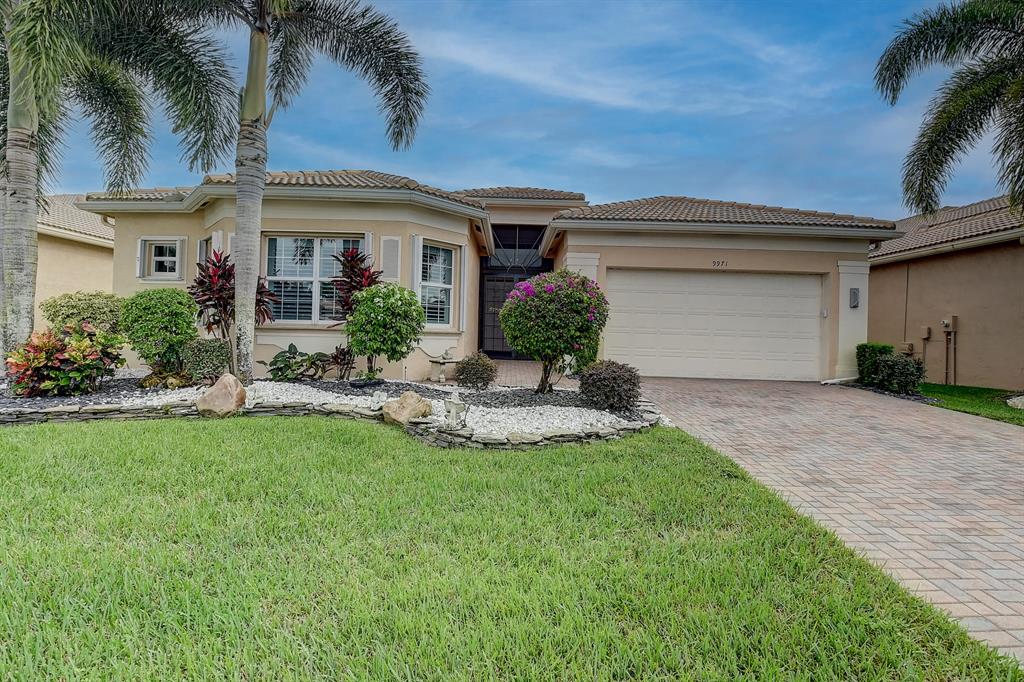 Gorgeous sought after Alexandra Grande model!! This beautiful home features 2 Primary suites & a 3rd bedroom which is currently used as a den/office. 18X18'' porcelain tile on the diagonal throughout living areas. Spectacular gourmet eat-in kitchen w/ custom 42'' antiqued wood cabinetry, upgraded appliances, custom backsplash, under cabinet lighting & custom built-in matching pantry w/ pull out drawers & shelves. Decorative molding in formal dining room, double tray ceiling in living room. Den boasts 20X20 porcelain tile as well as built-in desk & shelves. Primary suite boasts beautiful wood flooring, dual California style closets, bath features custom built in w/ shelves and drawers for added storage. 2nd Primary is en-suite and features Plantation shutters, & large walk-in closet. Other
